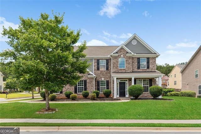3366 Bridge Walk Dr, Lawrenceville, GA 30044 - view of front of property featuring a front yard and brick siding