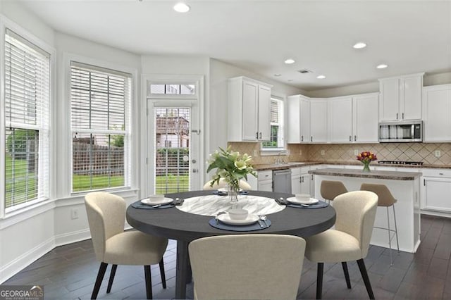 3366 Bridge Walk Dr, Lawrenceville, GA 30044 - dining room with plenty of natural light, dark wood-style flooring, and recessed lighting