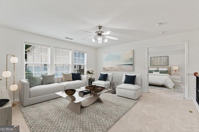 3366 Bridge Walk Dr, Lawrenceville, GA 30044 - carpeted living room featuring ceiling fan and baseboards