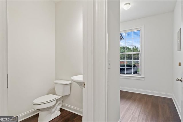 3366 Bridge Walk Dr, Lawrenceville, GA 30044 - half bath featuring wood finished floors and toilet