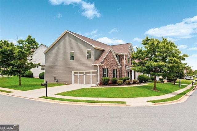 3366 Bridge Walk Dr, Lawrenceville, GA 30044 - traditional-style home featuring concrete driveway, an attached garage, a front yard, and brick siding