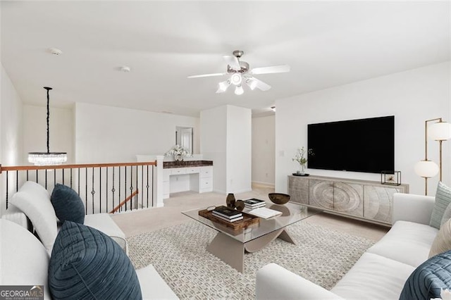 3366 Bridge Walk Dr, Lawrenceville, GA 30044 - carpeted living room featuring a ceiling fan and a chandelier
