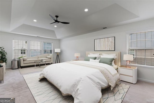 3366 Bridge Walk Dr, Lawrenceville, GA 30044 - bedroom with a raised ceiling, light colored carpet, recessed lighting, and ceiling fan