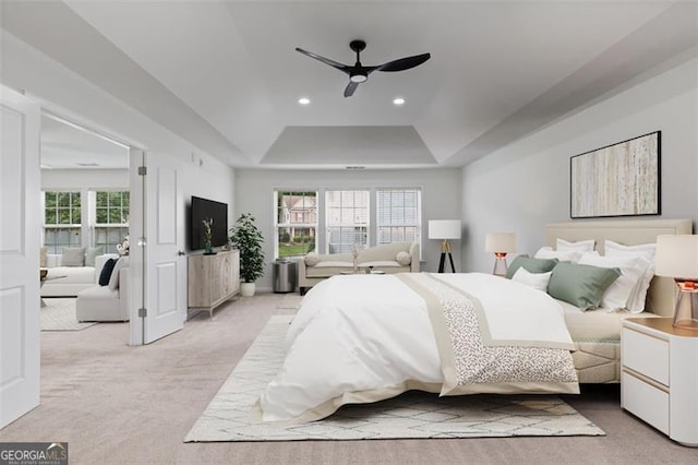 3366 Bridge Walk Dr, Lawrenceville, GA 30044 - bedroom featuring a tray ceiling, light colored carpet, recessed lighting, and ceiling fan