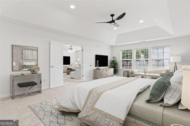3366 Bridge Walk Dr, Lawrenceville, GA 30044 - bedroom featuring a tray ceiling, recessed lighting, light carpet, and a ceiling fan