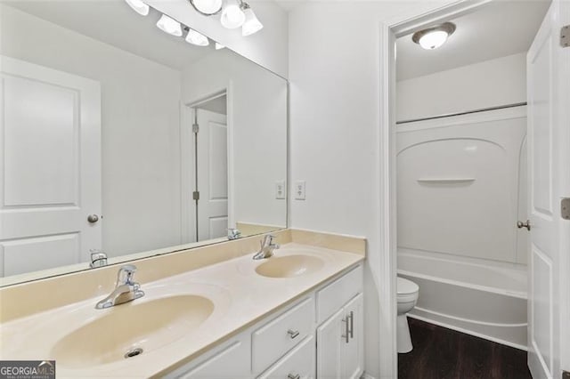 3366 Bridge Walk Dr, Lawrenceville, GA 30044 - bathroom featuring double vanity, wood finished floors, and bathing tub / shower combination