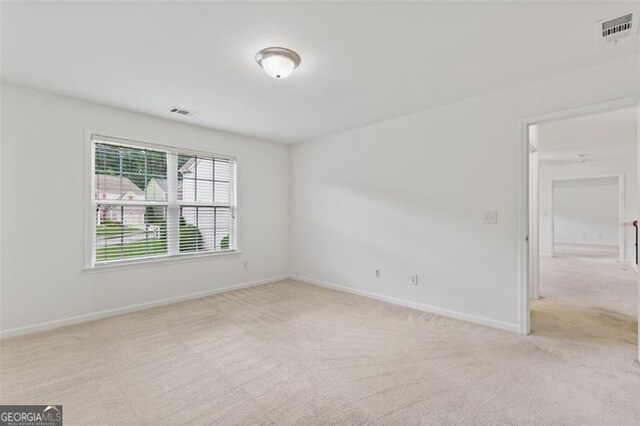 3366 Bridge Walk Dr, Lawrenceville, GA 30044 - spare room featuring light colored carpet