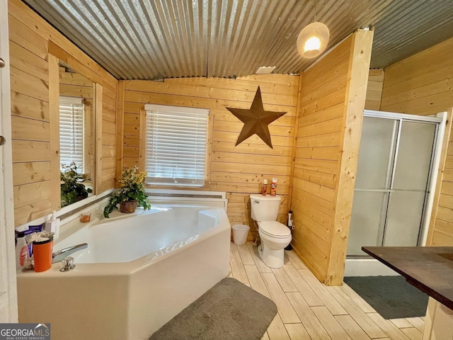 906 Billy Watts Cove Rd, Tiger, GA 30576 - full bath featuring wood walls, a bath, a stall shower, and wood finished floors
