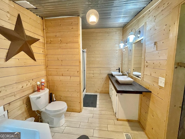 906 Billy Watts Cove Rd, Tiger, GA 30576 - full bath featuring wooden walls, vanity, a shower stall, and wood finished floors