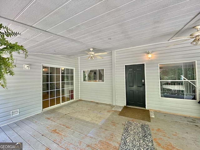 906 Billy Watts Cove Rd, Tiger, GA 30576 - property entrance featuring ceiling fan and a wooden deck