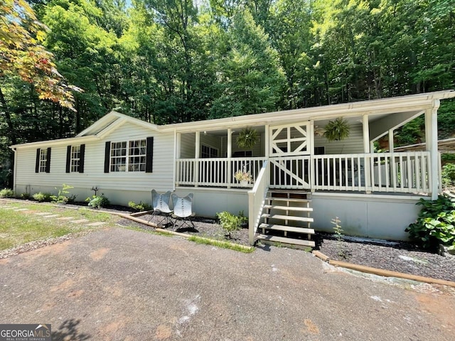 906 Billy Watts Cove Rd, Tiger, GA 30576 - manufactured / mobile home featuring covered porch