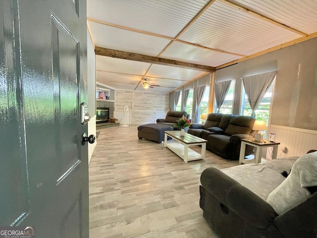 906 Billy Watts Cove Rd, Tiger, GA 30576 - living room featuring wood finished floors, wainscoting, a glass covered fireplace, and wood walls