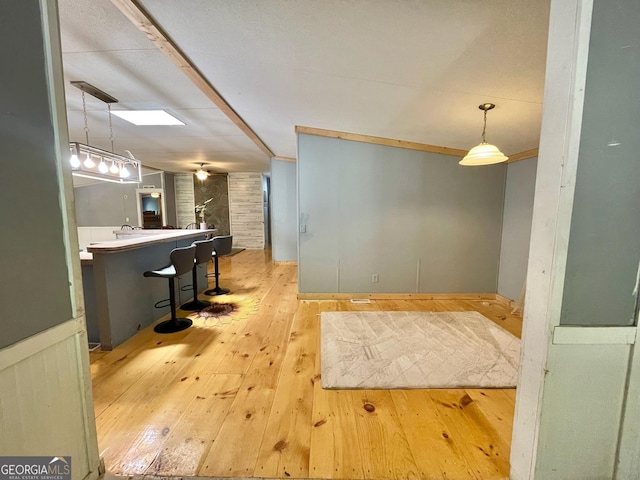 906 Billy Watts Cove Rd, Tiger, GA 30576 - kitchen with hardwood / wood-style flooring and hanging light fixtures