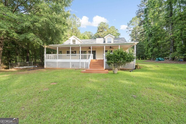 901 Jamesway Dr, Sparta, GA 31087 - country-style home with a ceiling fan, a front yard, and covered porch