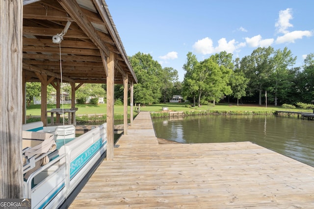 901 Jamesway Dr, Sparta, GA 31087 - dock featuring view of scattered trees, a water view, and a lawn