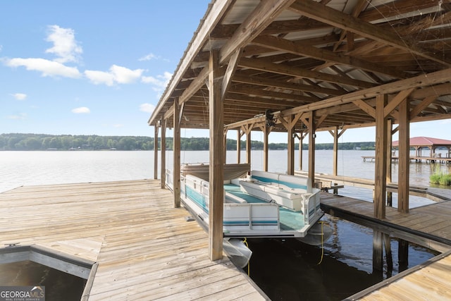 901 Jamesway Dr, Sparta, GA 31087 - dock featuring boat lift and a water view