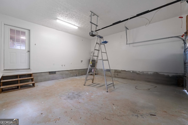 901 Jamesway Dr, Sparta, GA 31087 - garage featuring a garage door opener