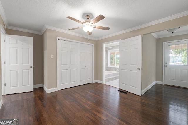 901 Jamesway Dr, Sparta, GA 31087 - entryway with dark wood finished floors, ceiling fan, ornamental molding, and a textured ceiling
