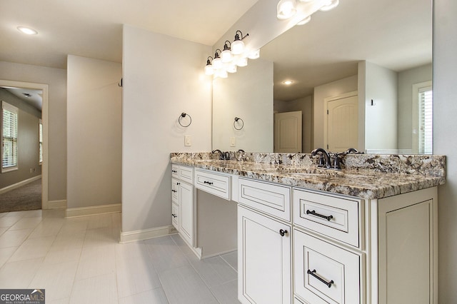 10 Ridgeview Ct, Newnan, GA 30263 - full bath with double vanity, plenty of natural light, and tile patterned flooring
