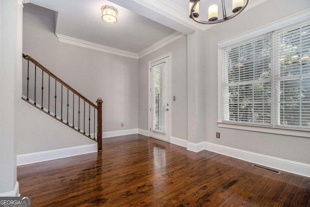 1836 Preserve Way, Brookhaven, GA 30341 - entrance foyer featuring a chandelier, wood finished floors, ornamental molding, and stairway