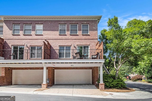 1836 Preserve Way, Brookhaven, GA 30341 - view of front of property featuring brick siding, an attached garage, and a balcony