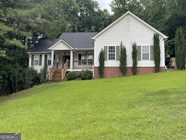 574 Saddle Ridge Dr, Bethlehem, GA 30620 - view of front facade featuring covered porch and a front yard