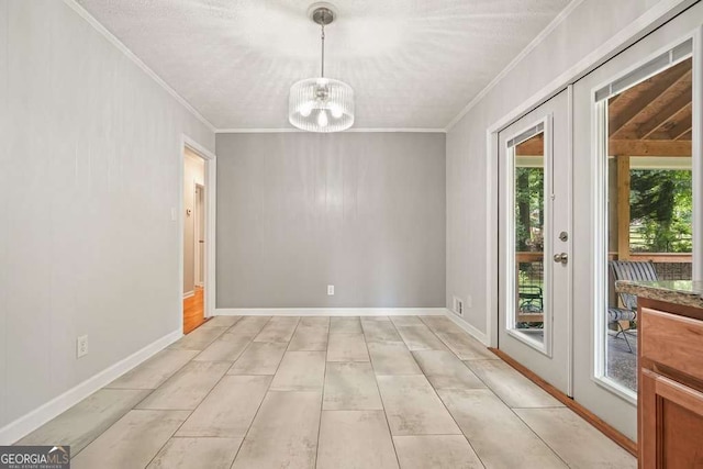 4212 Worth St NW, Acworth, GA 30101 - unfurnished dining area with a chandelier and ornamental molding