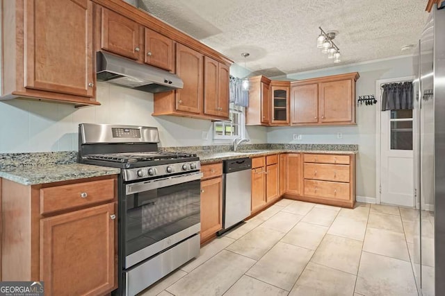4212 Worth St NW, Acworth, GA 30101 - kitchen featuring appliances with stainless steel finishes, under cabinet range hood, light stone counters, glass insert cabinets, and light tile patterned flooring