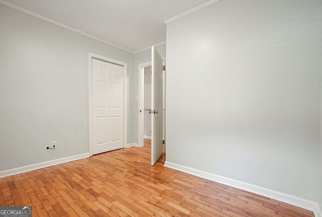4212 Worth St NW, Acworth, GA 30101 - unfurnished room with crown molding and light wood finished floors
