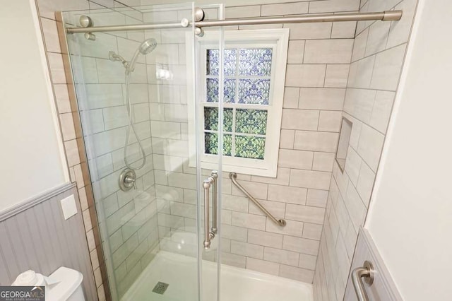 4212 Worth St NW, Acworth, GA 30101 - bathroom with a stall shower and a wainscoted wall
