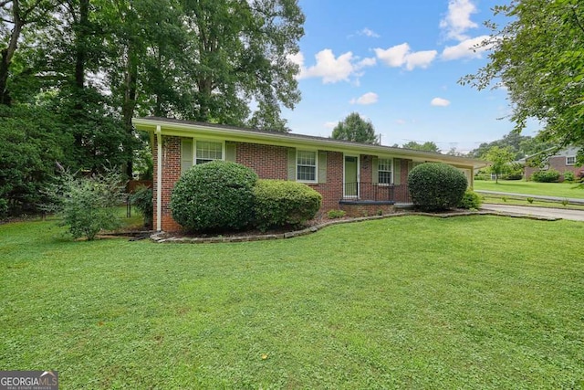 4212 Worth St NW, Acworth, GA 30101 - single story home with brick siding, driveway, and a front lawn