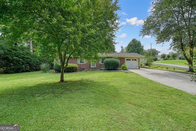 4212 Worth St NW, Acworth, GA 30101 - single story home with concrete driveway, a garage, brick siding, and a front lawn