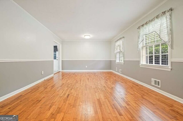 4212 Worth St NW, Acworth, GA 30101 - empty room featuring ornamental molding and hardwood / wood-style floors