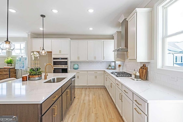 164 Palm St, Holly Springs, GA 30188 - kitchen featuring stainless steel appliances, white cabinets, light wood finished floors, backsplash, and recessed lighting
