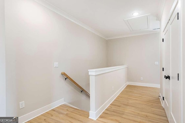164 Palm St, Holly Springs, GA 30188 - hallway with an upstairs landing, attic access, light wood-style flooring, crown molding, and recessed lighting