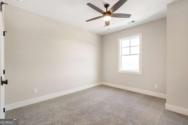 164 Palm St, Holly Springs, GA 30188 - carpeted empty room featuring a ceiling fan and baseboards
