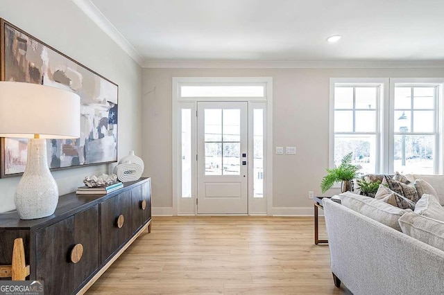 164 Palm St, Holly Springs, GA 30188 - entryway featuring ornamental molding and light wood-style flooring