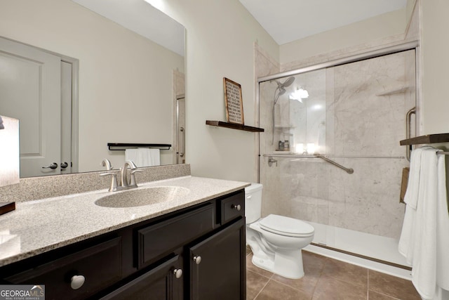 5640 Hammock Way, Cumming, GA 30028 - bathroom with vanity, a shower stall, and tile patterned floors