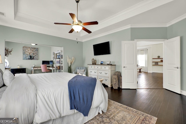 5640 Hammock Way, Cumming, GA 30028 - bedroom featuring a raised ceiling, wood-type flooring, ornamental molding, a ceiling fan, and an office area