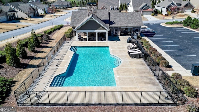 5640 Hammock Way, Cumming, GA 30028 - view of pool featuring a patio area and a residential view