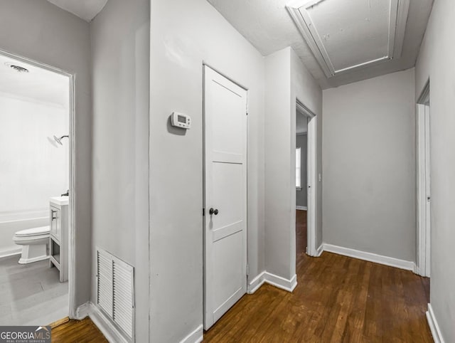 805 First Ave, Brunswick, GA 31520 - hall featuring attic access and wood finished floors