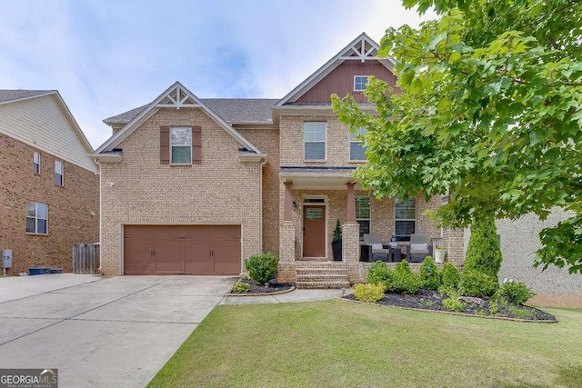 1830 Secretariat Gait Way, Suwanee, GA 30024 - craftsman-style house with brick siding, an attached garage, concrete driveway, a front lawn, and board and batten siding