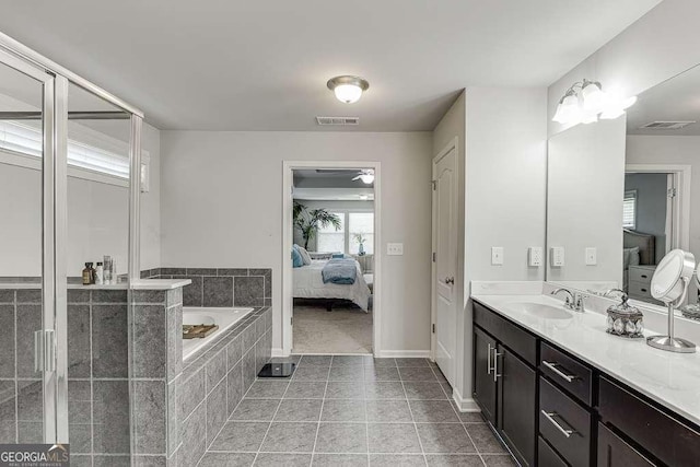 1830 Secretariat Gait Way, Suwanee, GA 30024 - ensuite bathroom featuring vanity, a bath, and tile patterned floors