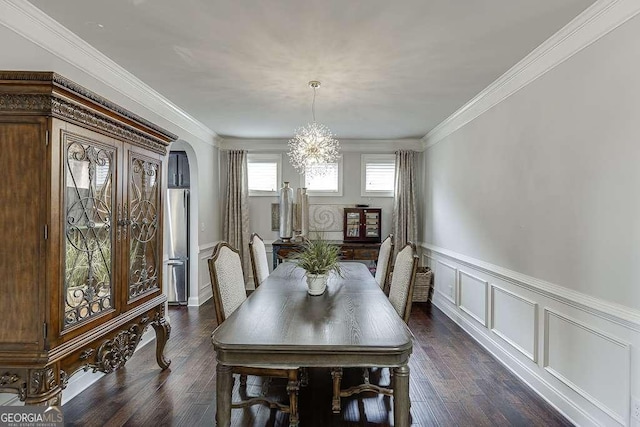 1830 Secretariat Gait Way, Suwanee, GA 30024 - dining area with a chandelier, wainscoting, dark wood-style floors, a decorative wall, and ornamental molding