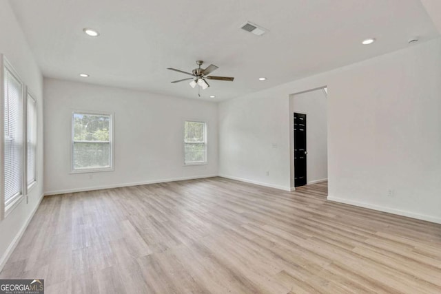 307 E Pine St E, Rockmart, GA 30153 - unfurnished room featuring plenty of natural light, a ceiling fan, light wood finished floors, and recessed lighting