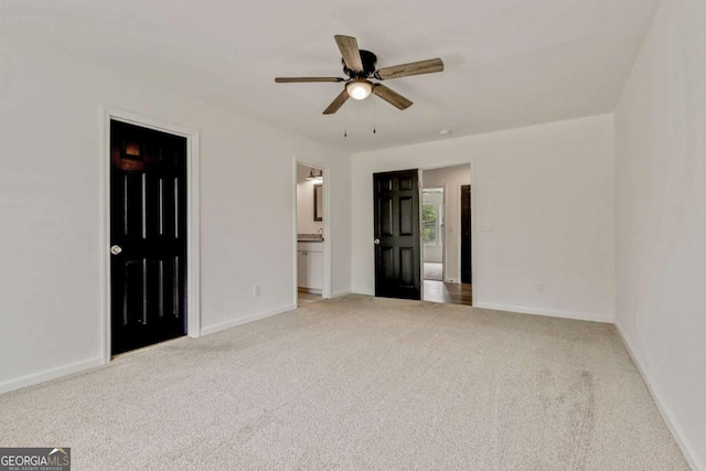 307 E Pine St E, Rockmart, GA 30153 - unfurnished bedroom with carpet, ensuite bath, and ceiling fan