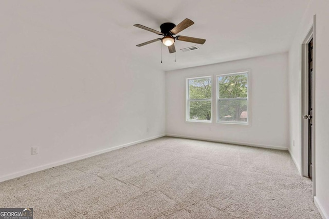 307 E Pine St E, Rockmart, GA 30153 - carpeted empty room with baseboards and a ceiling fan