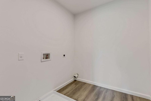 307 E Pine St E, Rockmart, GA 30153 - washroom featuring electric dryer hookup, hookup for a washing machine, and wood finished floors