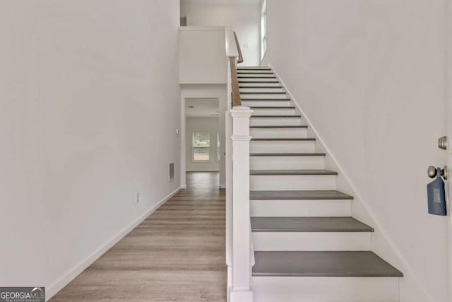 307 E Pine St E, Rockmart, GA 30153 - stairs with wood finished floors and baseboards