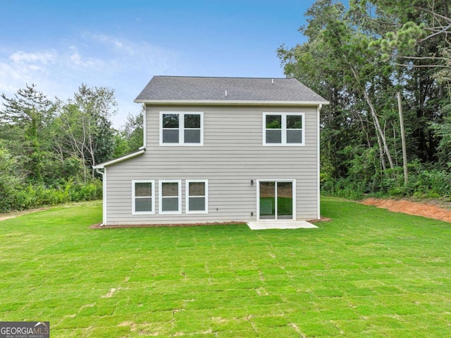 307 E Pine St E, Rockmart, GA 30153 - rear view of house with a yard